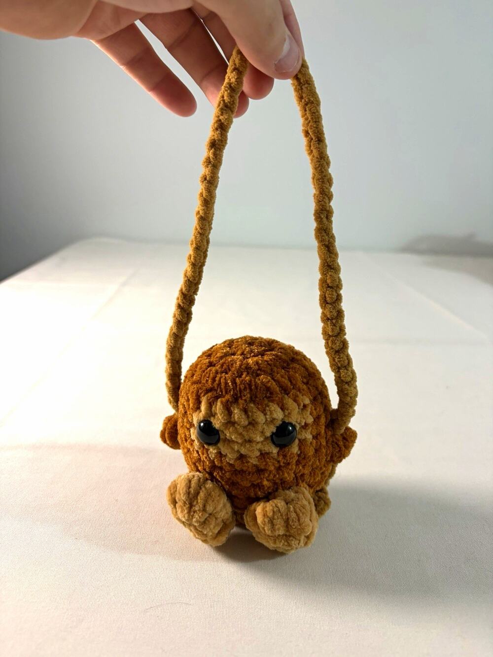 Handmade crocheted Big Foot swinging buddy plush for ages 3+